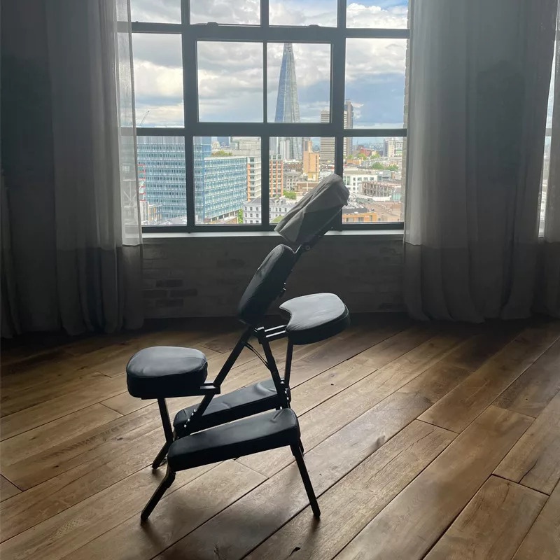 Office massage setup with ergonomic chair